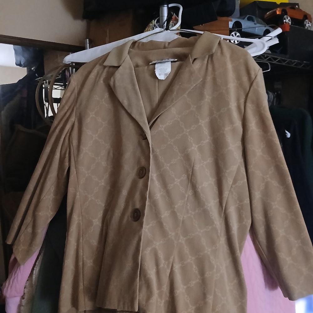 Tan Patterned Blazer With Tan Skirt.